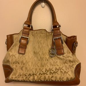 Michael Kors brown signature bag.